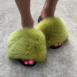 Lime green fox fur slides